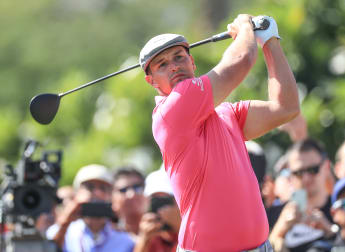 DeChambeau battles bug with big finish
