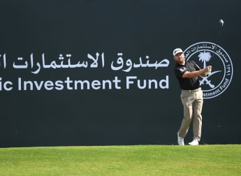 McDowell and Dubuisson together at the top