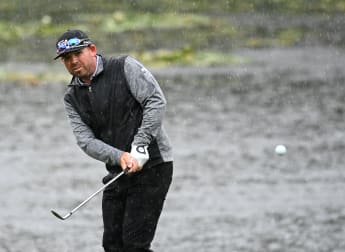 Walters waltzes ahead at rainy Belfry
