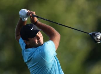 Reed battles into Winged Foot lead