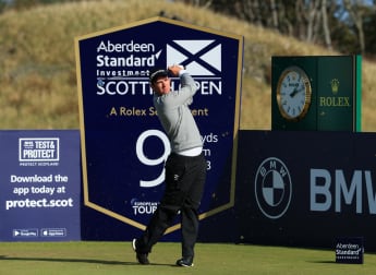 Herbert holds halfway lead in Scotland