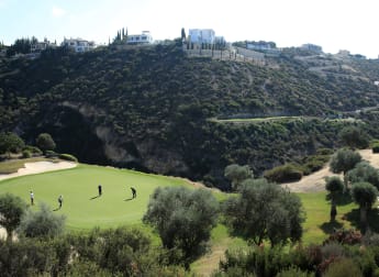 How does a course designer come to create a dramatic par three over a ravine? 