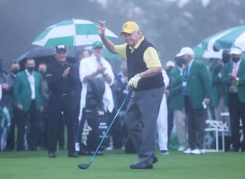 Honorary starters get Masters under way before inclement weather causes lengthy delay