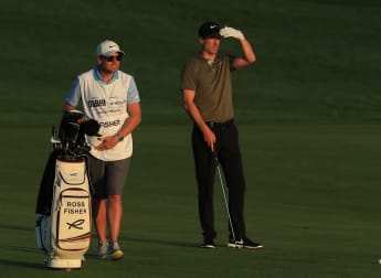 Flawless Fisher sets halfway clubhouse lead in Dubai