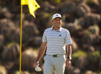 Garcia into last 16 after play-off ace in Texas