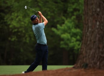 Rose battles back again to keep Masters lead