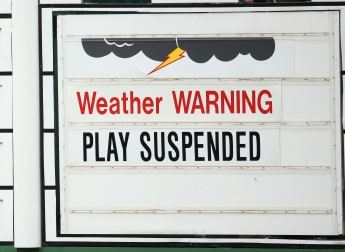 Rose leads as weather holds up Masters on Moving Day