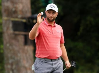 New father Rahm charges to another Masters top ten