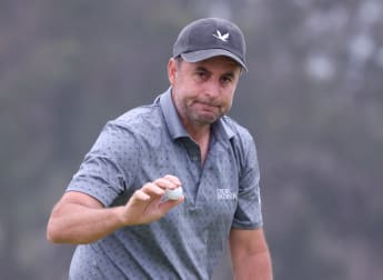 Bland maintains momentum to make U.S. Open history