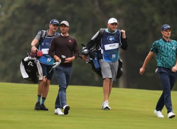 Stand in caddies help Scott and Rose shine