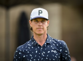 Broberg eight clear after sensational 61