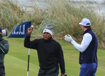 Former NFL star Rashad makes stunning ace - then texts Tiger