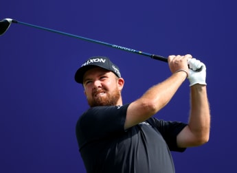 Lowry part of leading trio after dramatic day in Dubai