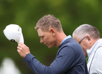 Schmid goes low to share lead in Belgium