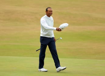 Tiger Woods hails warm ovation on emotional walk up 18th at St Andrews
