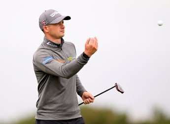 David Law posts opening 65 with his manager on the bag