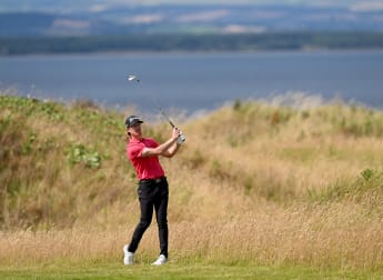 Sean Crocker leads by two after big finish