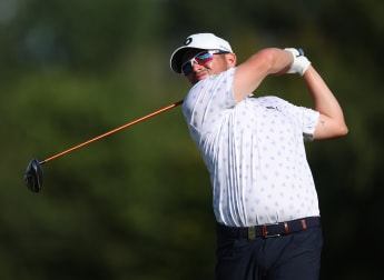 Ewen Ferguson retains lead after day three battle