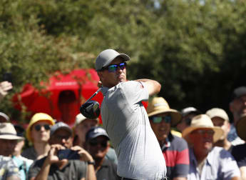 Adam Scott finishes in style to lead on home soil
