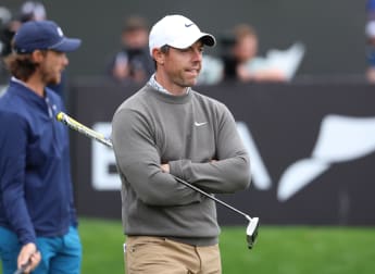 Rory McIlroy produces big finish to share clubhouse lead in Dubai