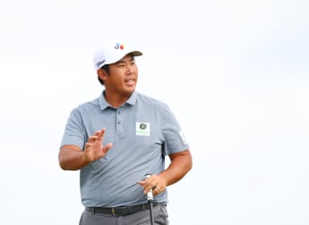 Byeong-hun An ties Renaissance record to lead in Scotland