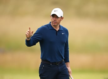 Rory McIlroy takes narrow lead into weekend in Scotland