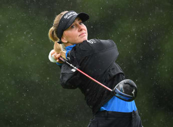 Playing partners: Olivia Cowan and Todd Clements enjoy 'fun' final round