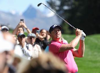 Matt Wallace braves the elements to lead by four at Crans Montana
