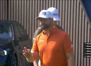 Matthew Baldwin hits it close at the par-three 14th to rejoin the leaders