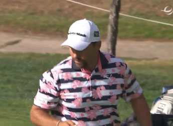 Romain Langasque chips in at the 11th for a first birdie of his round