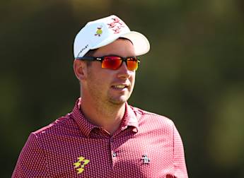 Lucas Herbert moves four clear at halfway stage