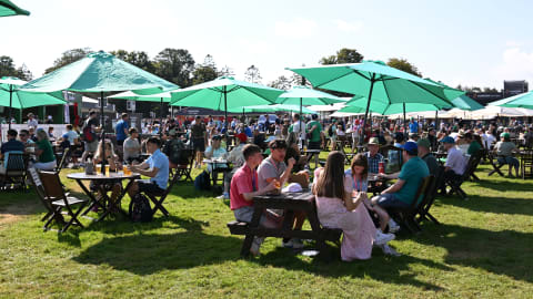 Fans gather in the Championship Village for refreshments and activities