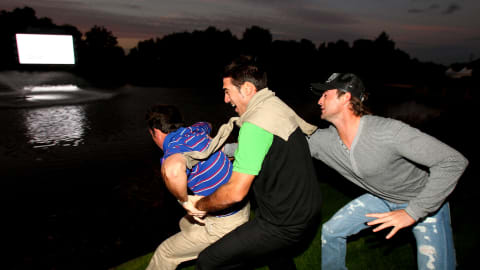 Gonzalo Fernandez-Castano celebrates in the lake after beating Lee Westwood in a play-off at the Belfry in 2008