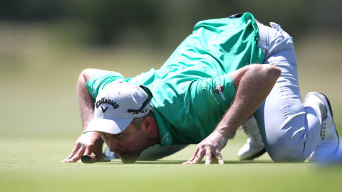 Stuart Manley of Wales checks his putting line on the 14th hole during day four of the 2020 Limpopo Championship