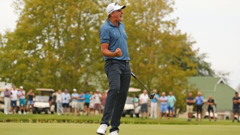 Christiaan Bezuidenhout roars with delight after holing an eagle putt for victory on the 72nd hole at the Dimension Data Pro-Am