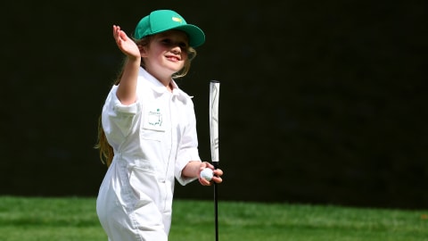 Shane Lowry's eldest daughter Iris waves to the patrons