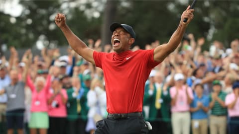 Woods celebrates winning his fifth Green Jacket at the 2019 Masters / Credit: Andrew Redington