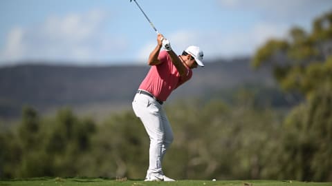 Adrian Otaegui plays his approach shot on the fifth hole