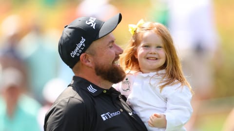 Big smiles! Shane Lowry with his youngest daughter Ivy