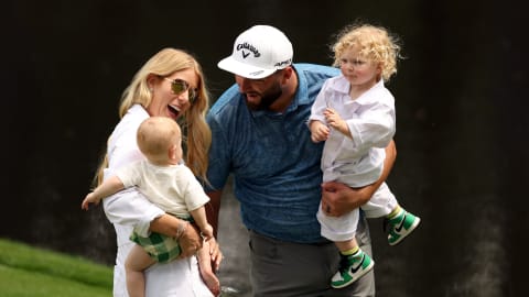 Rahm holds Kepa as he looks on at Eneko