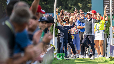 Fans playing the Mega Putt in spectator village