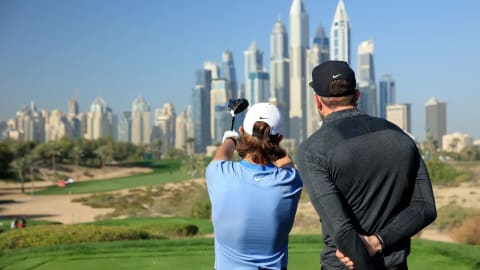 Tommy Fleetwood and his caddie Ian Finnis discuss strategy