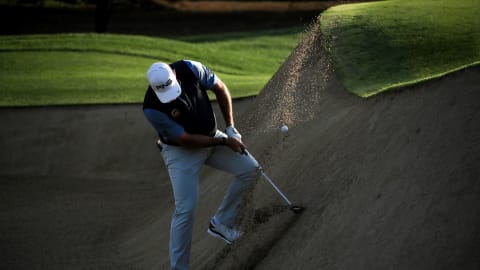 Lee Westwood plays out from a difficult lie 