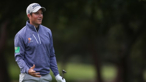 Rhys Enoch of Wales reacts to his shot on the 5th hole during day one of the RAM Cape Town Open