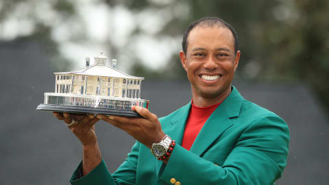 Woods proudly holds aloft the Masters Trophy after ending an 11-year wait for his 15th Major in 2019 / Credit: Andrew Redington