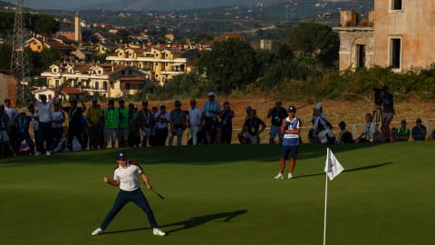 Matt Fitzpatrick celebrates holing a putt in Saturday's four-balls