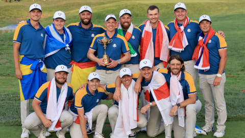 Team Europe celebrate with the Ryder Cup trophy