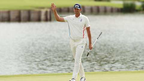Victor Perez acknowledges the crowd after a brilliant burst of scoring midway through his back nine moved him into medal contention. He ultimately finished fourth.