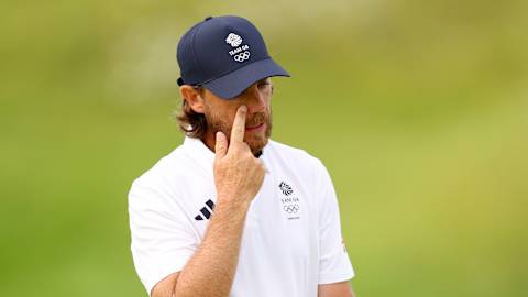 Tommy Fleetwood reacts to a missed putt at the 17th, shortly before parring the last to win silver