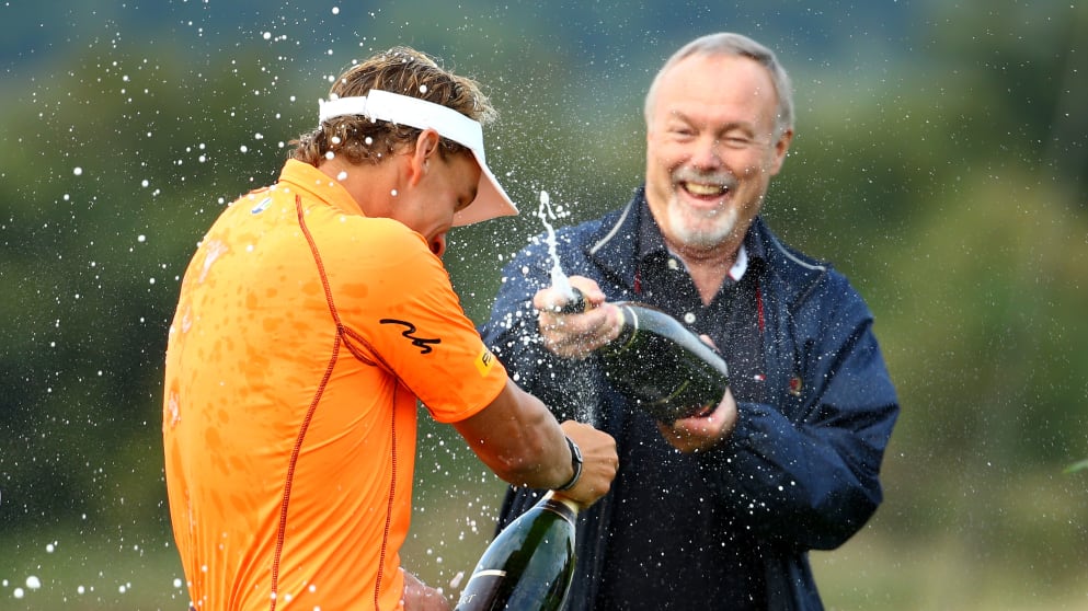 Joost Luiten (L) of the Netherlands and Sir Terry Matthews (R)